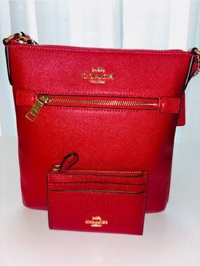 Authentic Coach pebble red leather bag with matching card holder. (mini)
